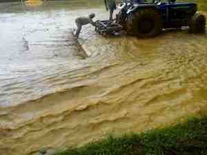 Rice Farming in Flooded Field Using Bund System